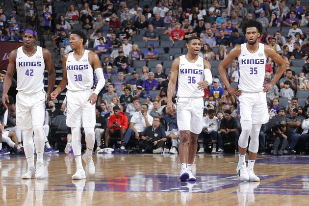 SACRAMENTO, CA - JULY 5: Devin Williams #42, Anthony Brown #38, Allerik Freeman #36 and Marvin Bagley III #35 of the Sacramento Kings look on during the game against the Miami Heat during the 2018 Summer League at the Golden 1 Center on July 5, 2018 in Sacramento, California. NOTE TO USER: User expressly acknowledges and agrees that, by downloading and or using this photograph, User is consenting to the terms and conditions of the Getty Images License Agreement. Mandatory Copyright Notice: Copyright 2018 NBAE (Photo by Rocky Widner/NBAE via Getty Images)