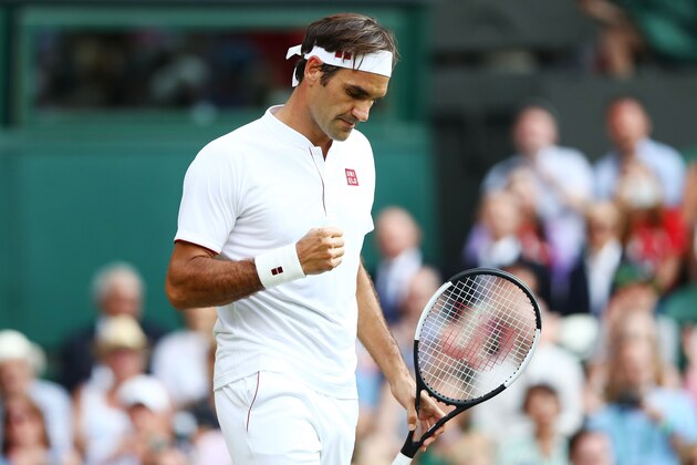 LONDON, ENGLAND - JULY 06:  Roger Federer of Switzerland celebrates a point against Jan-Lennard Struff of Germany during their Men's Singles third round match on day five of the Wimbledon Lawn Tennis Championships at All England Lawn Tennis and Croquet Club on July 6, 2018 in London, England.  (Photo by Matthew Stockman/Getty Images)