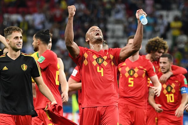 Belgium's defender Vincent Kompany (C) celebrates their win during the Russia 2018 World Cup quarter-final football match between Brazil and Belgium at the Kazan Arena in Kazan on July 6, 2018. - Belgium beat World Cup favourites Brazil 2-1 on Friday to set up a semi-final against France in Saint Petersburg. (Photo by Jewel SAMAD / AFP) / RESTRICTED TO EDITORIAL USE - NO MOBILE PUSH ALERTS/DOWNLOADS        (Photo credit should read JEWEL SAMAD/AFP/Getty Images)