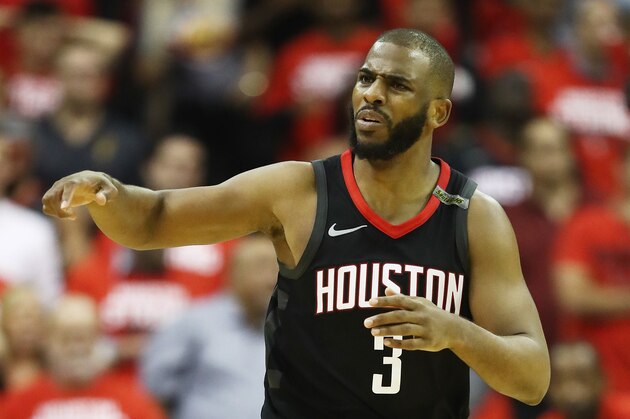 HOUSTON, TX - MAY 24:  Chris Paul #3 of the Houston Rockets reacts against the Golden State Warriors in the fourth quarter of Game Five of the Western Conference Finals of the 2018 NBA Playoffs at Toyota Center on May 24, 2018 in Houston, Texas. NOTE TO USER: User expressly acknowledges and agrees that, by downloading and or using this photograph, User is consenting to the terms and conditions of the Getty Images License Agreement. (Photo by Ronald Martinez/Getty Images)