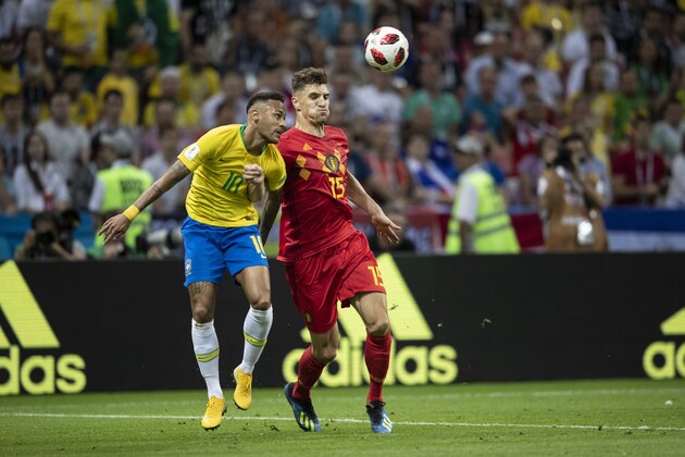 KAZAN, RUSSIA - JULY 06:  Brazil's forward Neymar (L) vies with Belgium's defender Thomas Meunier during the Russia 2018 World Cup quarter-final football match between Brazil and Belgium at the Kazan Arena in Kazan on July 6, 2018.  (Photo by Fred Lee/Getty Images)
