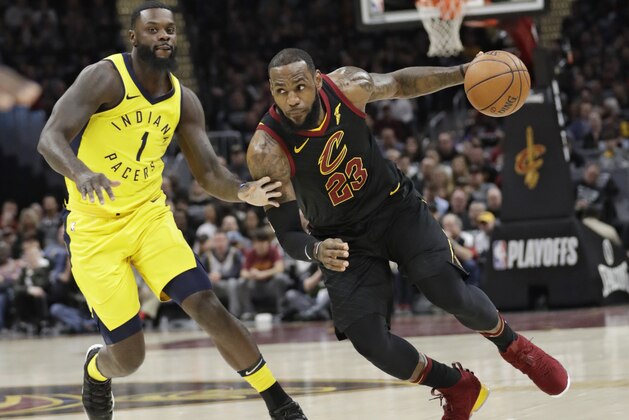 Cleveland Cavaliers' LeBron James (23) drives against Indiana Pacers' Lance Stephenson (1) in the first half of Game 7 of an NBA basketball first-round playoff series, Sunday, April 29, 2018, in Cleveland. (AP Photo/Tony Dejak)