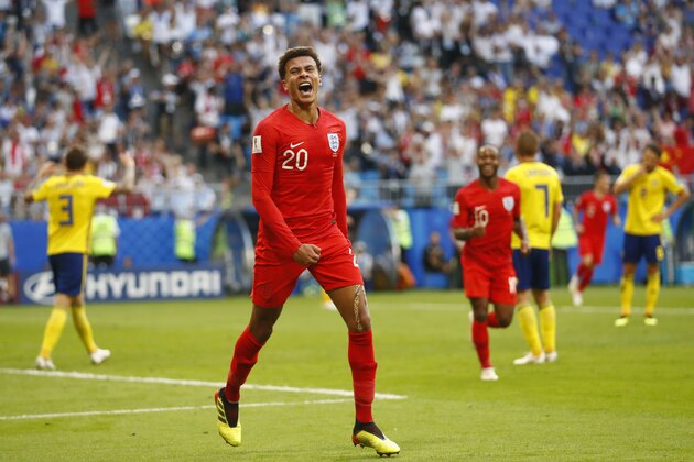 England's Dele Alli celebrates after scoring his side's second goal during the quarterfinal match between Sweden and England at the 2018 soccer World Cup in the Samara Arena, in Samara, Russia, Saturday, July 7, 2018. (AP Photo/Matthias Schrader )