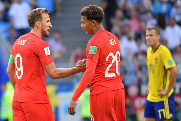 TOPSHOT - England's midfielder Dele Alli (C) celebrates with England's forward Harry Kane after scoring their second goal during the Russia 2018 World Cup quarter-final football match between Sweden and England at the Samara Arena in Samara on July 7, 2018. (Photo by EMMANUEL DUNAND / AFP) / RESTRICTED TO EDITORIAL USE - NO MOBILE PUSH ALERTS/DOWNLOADS        (Photo credit should read EMMANUEL DUNAND/AFP/Getty Images)