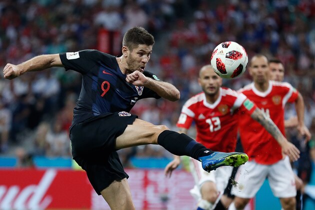 Croatia's forward Andrej Kramaric (L) attempts a shot during the Russia 2018 World Cup quarter-final football match between Russia and Croatia at the Fisht Stadium in Sochi on July 7, 2018. (Photo by Adrian DENNIS / AFP) / RESTRICTED TO EDITORIAL USE - NO MOBILE PUSH ALERTS/DOWNLOADS        (Photo credit should read ADRIAN DENNIS/AFP/Getty Images)