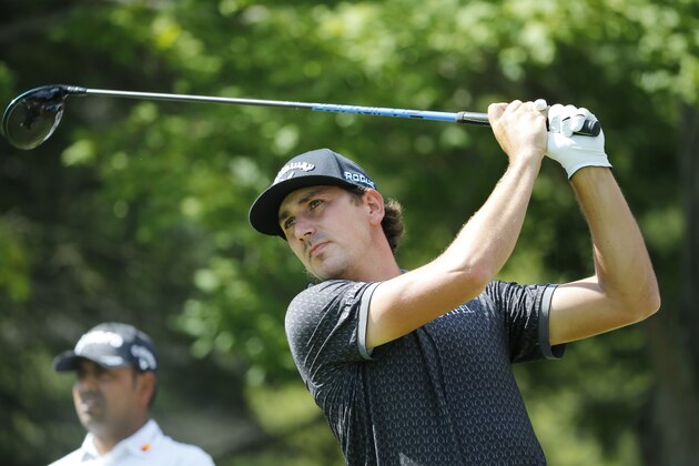 Kelly Kraft watches his tee shot on the 12th hole during the third round of the Military Tribute PGA Tour Golf Tournament at the Greenbrier in White Sulphur Springs, W. Va., Saturday, July 7, 2018. (AP Photo/Steve Helber)