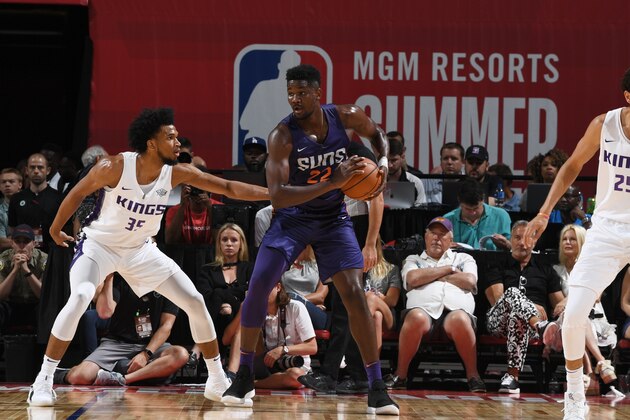 LAS VEGAS, NV - JULY 7:  Deandre Ayton #22 of the Phoenix Suns handles the ball against the Sacramento Kings during the 2018 Las Vegas Summer League on July 7, 2018 at the Thomas & Mack Center in Las Vegas, Nevada. NOTE TO USER: User expressly acknowledges and agrees that, by downloading and/or using this Photograph, user is consenting to the terms and conditions of the Getty Images License Agreement. Mandatory Copyright Notice: Copyright 2018 NBAE (Photo by Garrett Ellwood/NBAE via Getty Images)
