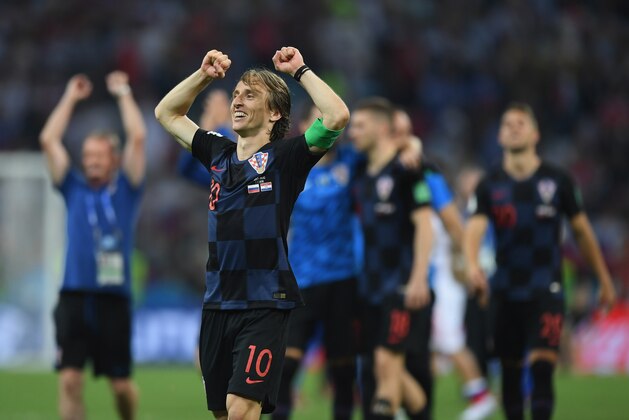 SOCHI, RUSSIA - JULY 07:  Luka Modric of Croatia celebrates following their sides victory during the 2018 FIFA World Cup Russia Quarter Final match between Russia and Croatia at Fisht Stadium on July 7, 2018 in Sochi, Russia.  (Photo by Shaun Botterill/Getty Images)