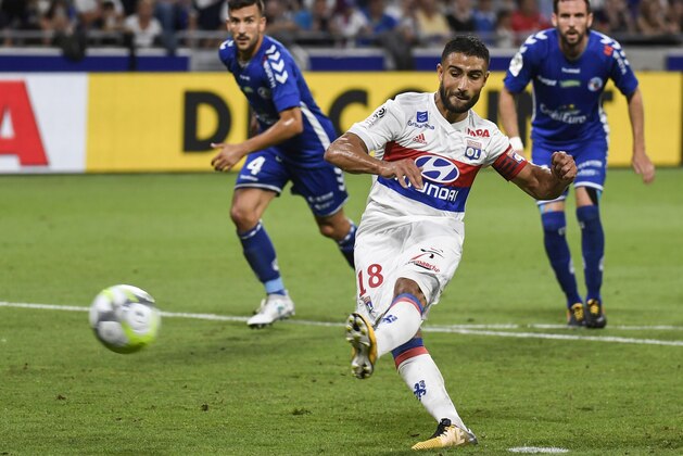 Lyon's French forward Nabil Fekir shoots and scores a penalty during the Ligue1 football match Olympique Lyonnais against Racing Club de Strasbourg Alsace, on August 5, 2017 at the Groupama stadium in Decines-Charpieu near Lyon, southeastern France.  / AFP PHOTO / PHILIPPE DESMAZES        (Photo credit should read PHILIPPE DESMAZES/AFP/Getty Images)