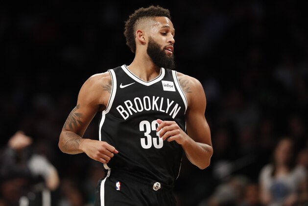 Brooklyn Nets guard Allen Crabbe (33) runs down court during the first half of an NBA basketball game against the Chicago Bulls, Monday, April 9, 2018, in New York. Crabbe had 41 points in the Nets 114-105 victory over the Bulls. (AP Photo/Kathy Willens)