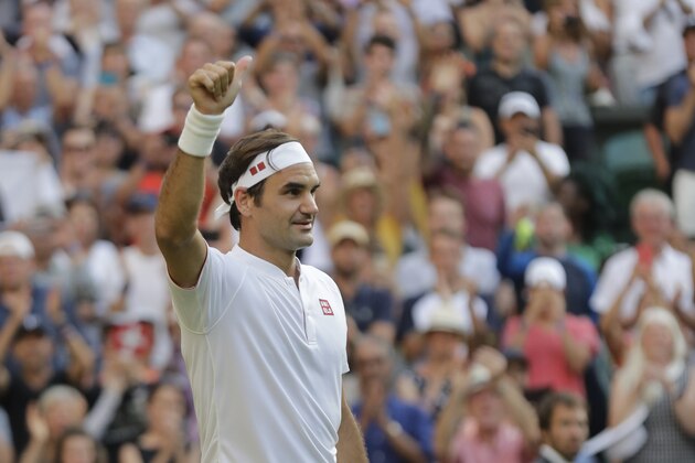 Switzerland's Roger Federer gives a thumbs up after winning his men's singles match against Germany's Jan-Lennard Struff, on the fifth day of the Wimbledon Tennis Championships in London, Friday July 6, 2018. (AP Photo/Ben Curtis) Switzerland's Roger Federer gives a thumbs up after winning his men's singles match against Germany's Jan-Lennard Struff, on the fifth day of the Wimbledon Tennis Championships in London, Friday July 6, 2018. (AP Photo/Ben Curtis)
