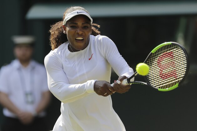 Serena Williams of the United States returns the ball to France's Kristina Mladenovic during their women's singles match, on the fifth day of the Wimbledon Tennis Championships in London, Friday July 6, 2018. (AP Photo/Ben Curtis)