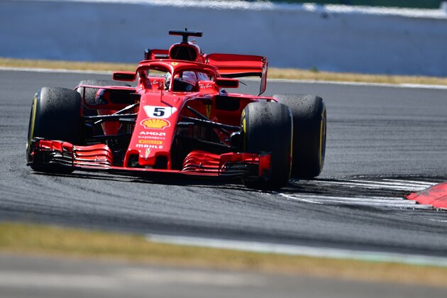 Ferrari's German driver Sebastian Vettel leads during the British Formula One Grand Prix at the Silverstone motor racing circuit in Silverstone, central England, on July 8, 2018. (Photo by Andrej ISAKOVIC / AFP)        (Photo credit should read ANDREJ ISAKOVIC/AFP/Getty Images)