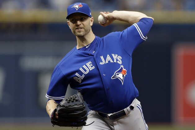 Toronto Blue Jays' J.A. Happ pitches to the Tampa Bay Rays during the first inning of a baseball game Wednesday, June 13, 2018, in St. Petersburg, Fla. (AP Photo/Chris O'Meara)