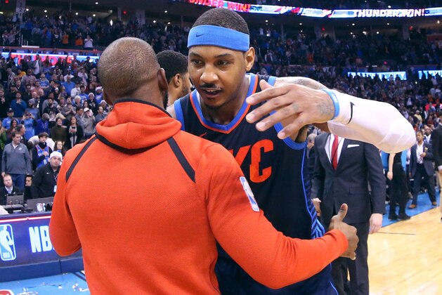 OKLAHOMA CITY, OK- DECEMBER 25:  Carmelo Anthony #7 of the Oklahoma City Thunder and Chris Paul #3 of the Houston Rockets hug after the game on December 25, 2017 at Chesapeake Energy Arena in Oklahoma City, Oklahoma. NOTE TO USER: User expressly acknowledges and agrees that, by downloading and or using this photograph, User is consenting to the terms and conditions of the Getty Images License Agreement. Mandatory Copyright Notice: Copyright 2017 NBAE (Photo by Layne Murdoch Sr./NBAE via Getty Images)
