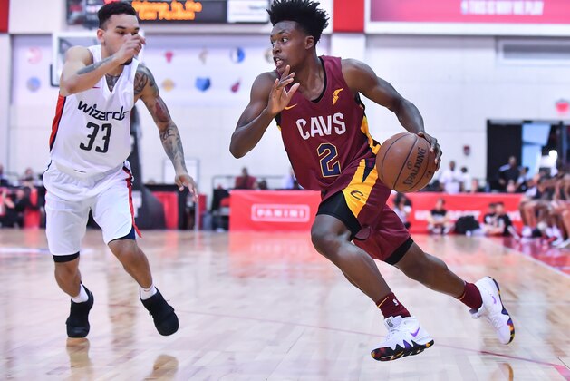 LAS VEGAS, NV - JULY 06:  Collin Sexton #2 of the Cleveland Cavaliers dribbles against Chris Chiozza #33 of the Washington Wizards during the 2018 NBA Summer League at the Cox Pavilion on July 6, 2018 in Las Vegas, Nevada. The Cavaliers defeated the Wizards 72-59. NOTE TO USER: User expressly acknowledges and agrees that, by downloading and or using this photograph, User is consenting to the terms and conditions of the Getty Images License Agreement.  (Photo by Sam Wasson/Getty Images)