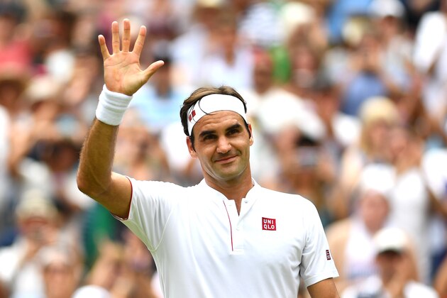 LONDON, ENGLAND - JULY 09:  Roger Federer of Switzerland thanks the crowd after winning his Men's Singles fourth round match against Adrian Mannarino of France on day seven of the Wimbledon Lawn Tennis Championships at All England Lawn Tennis and Croquet Club on July 9, 2018 in London, England.  (Photo by Clive Mason/Getty Images)