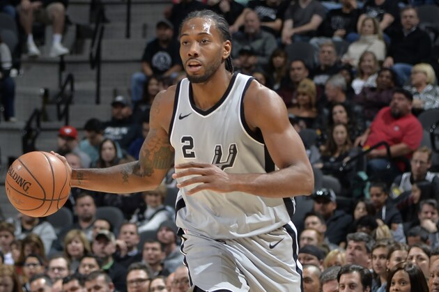 SAN ANTONIO, TX - JANUARY 13:  Kawhi Leonard #2 of the San Antonio Spurs handles the ball against the Denver Nuggets on January 13, 2018 at the AT&T Center in San Antonio, Texas. NOTE TO USER: User expressly acknowledges and agrees that, by downloading and or using this photograph, user is consenting to the terms and conditions of the Getty Images License Agreement. Mandatory Copyright Notice: Copyright 2018 NBAE (Photos by Mark Sobhani/NBAE via Getty Images)