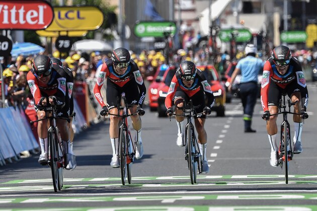 Riders of USA's BMC Racing cycling team cross the finish line of the third stage of the 105th edition of the Tour de France cycling race, a 35.5 km team time-trial around Cholet, western France, on July 9, 2018. (Photo by Marco BERTORELLO / AFP)        (Photo credit should read MARCO BERTORELLO/AFP/Getty Images)