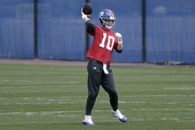 New York Giants quarterback Eli Manning participates in a NFL football training camp in East Rutherford, N.J., Tuesday, April 24, 2018. (AP Photo/Seth Wenig)