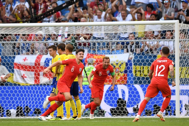 SAMARA, RUSSIA - JULY 07:  Harry Maguire of England celebrates scoring his side's first goal during the 2018 FIFA World Cup Russia Quarter Final match between Winner Game 55 and Winner Game 56 at Samara Arena on July 7, 2018 in Samara, Russia.  (Photo by Etsuo Hara/Getty Images)