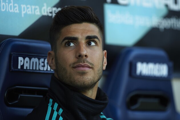 VILLARREAL, SPAIN - MAY 19:  Marco Asensio of Real Madrid sits on the substitutes bench during the La Liga match between Villarreal and Real Madrid at Estadio de La Ceramica on May 19, 2018 in Villarreal, Spain.  (Photo by Manuel Queimadelos Alonso/Getty Images)