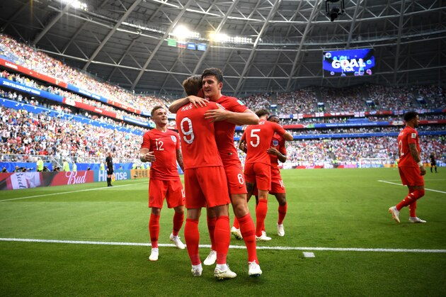 SAMARA, RUSSIA - JULY 07:  Harry Maguire of England celebrates with Harry Kane after scoring his team's first goal during the 2018 FIFA World Cup Russia Quarter Final match between Sweden and England at Samara Arena on July 7, 2018 in Samara, Russia.  (Photo by Matthias Hangst/Getty Images)