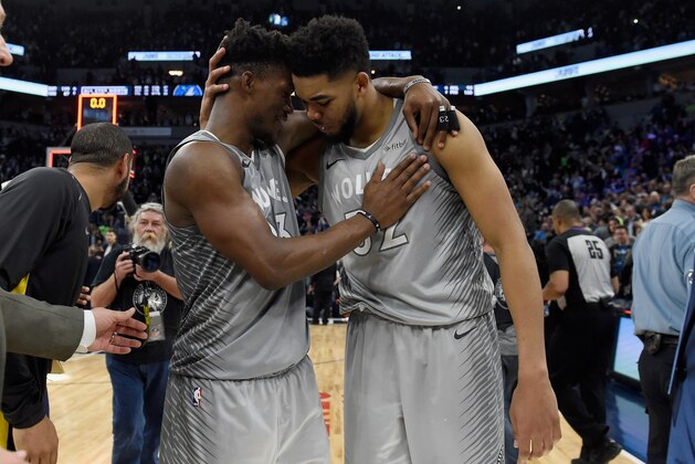 MINNEAPOLIS, MN - APRIL 11: Jimmy Butler #23 and Karl-Anthony Towns #32 of the Minnesota Timberwolves celebrate after winning the game against the Denver Nuggets on April 11, 2018 at the Target Center in Minneapolis, Minnesota. The Timberwolves defeated the Nuggets 112-106. NOTE TO USER: User expressly acknowledges and agrees that, by downloading and or using this Photograph, user is consenting to the terms and conditions of the Getty Images License Agreement. (Photo by Hannah Foslien/Getty Images)