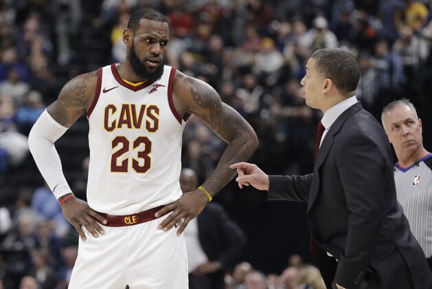 Cleveland Cavaliers head coach Tyronn Lue, front right, talks with LeBron James during the second half of an NBA basketball game against the Indiana Pacers, Friday, Jan. 12, 2018, in Indianapolis. (AP Photo/Darron Cummings)