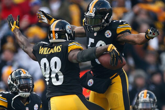 PITTSBURGH, PA - DECEMBER 21:  Vince Williams #98 of the Pittsburgh Steelers celebrates with Ryan Shazier #50 after his fumble recovery during the third quarter against the Kansas City Chiefs at Heinz Field on December 21, 2014 in Pittsburgh, Pennsylvania.  (Photo by Gregory Shamus/Getty Images)