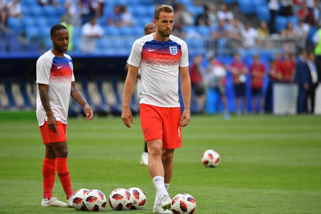 England's forward Harry Kane (R) drives a ball past England's forward Raheem Sterling during the warm-up before the Russia 2018 World Cup quarter-final football match between Sweden and England at the Samara Arena in Samara on July 7, 2018. (Photo by EMMANUEL DUNAND / AFP) / RESTRICTED TO EDITORIAL USE - NO MOBILE PUSH ALERTS/DOWNLOADS        (Photo credit should read EMMANUEL DUNAND/AFP/Getty Images)