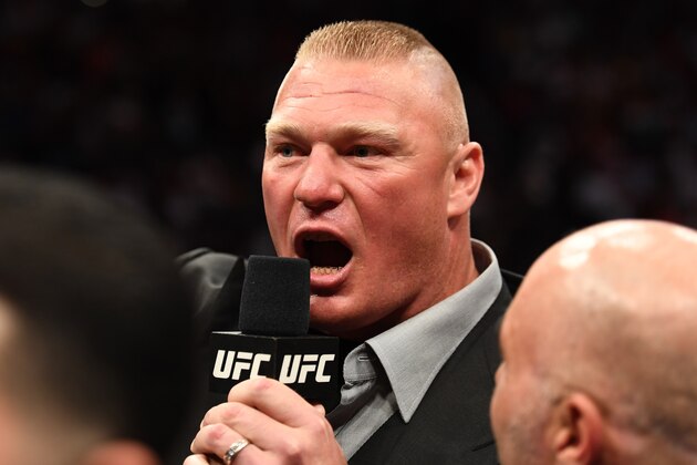 LAS VEGAS, NV - JULY 07:  Brock Lesnar confronts Daniel Cormier in their UFC heavyweight championship fight during the UFC 226 event inside T-Mobile Arena on July 7, 2018 in Las Vegas, Nevada.  (Photo by Josh Hedges/Zuffa LLC/Zuffa LLC via Getty Images)