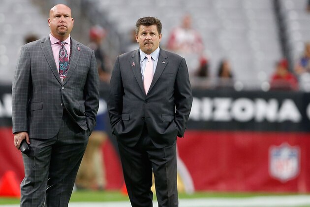 GLENDALE, AZ - OCTOBER 04: (L-R) Head coach Bruce Arians of the Arizona Cardinals, general manager Steve Keim, and president Michael J. Bidwell watch warmups before the start of the NFL game against the St. Louis Rams at the University of Phoenix Stadium on October 4, 2015 in Glendale, Arizona.  (Photo by Christian Petersen/Getty Images)