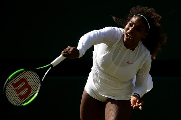 LONDON, ENGLAND - JULY 10:  Serena Williams of the United States serves against Camila Giorgi of Italy during their Ladies' Singles Quarter-Finals match on day eight of the Wimbledon Lawn Tennis Championships at All England Lawn Tennis and Croquet Club on July 10, 2018 in London, England.  (Photo by Julian Finney/Getty Images)