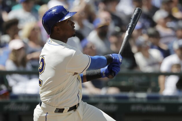 Seattle Mariners' Jean Segura takes a swing during a baseball game against the Colorado Rockies, Sunday, July 8, 2018, in Seattle. (AP Photo/Ted S. Warren)