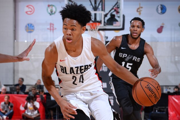 LAS VEGAS, NV - JULY 10: Anfernee Simons #24 of the Portland Trail Blazers handles the ball against the San Antonio Spurs during the 2018 Las Vegas Summer League on July 10, 2018 at the Cox Pavilion in Las Vegas, Nevada. NOTE TO USER: User expressly acknowledges and agrees that, by downloading and/or using this photograph, user is consenting to the terms and conditions of the Getty Images License Agreement. Mandatory Copyright Notice: Copyright 2018 NBAE (Photo by Bart Young/NBAE via Getty Images)