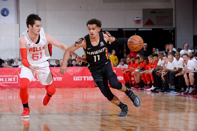 LAS VEGAS, NV - JULY 10: Trae Young #11 of the Atlanta Hawks handles the ball against the Chicago Bulls during the 2018 Las Vegas Summer League on July 10, 2018 at the Cox Pavilion in Las Vegas, Nevada. NOTE TO USER: User expressly acknowledges and agrees that, by downloading and/or using this Photograph, user is consenting to the terms and conditions of the Getty Images License Agreement. Mandatory Copyright Notice: Copyright 2018 NBAE (Photo by Bart Young/NBAE via Getty Images)