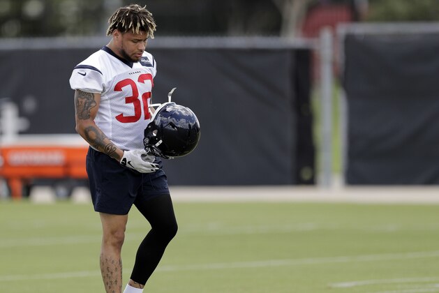 Houston Texans defensive back Tyrann Mathieu pauses between drills during an NFL football minicamp practice Tuesday, June 12, 2018, in Houston. (AP Photo/David J. Phillip)