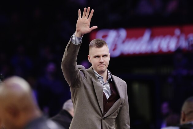New York Knicks' Kristaps Porzingis (6) waves to fans before an NBA basketball game against the Dallas Mavericks Tuesday, March 13, 2018, in New York. (AP Photo/Frank Franklin II)