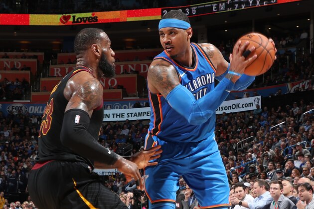 OKLAHOMA CITY, OK - FEBRUARY 13: LeBron James #23 of the Cleveland Cavaliers defends Carmelo Anthony #7 of the Oklahoma City Thunder during the game on February 13, 2018 at Chesapeake Energy Arena in Oklahoma City, Oklahoma. NOTE TO USER: User expressly acknowledges and agrees that, by downloading and/or using this photograph, user is consenting to the terms and conditions of the Getty Images License Agreement. Mandatory Copyright Notice: Copyright 2018 NBAE (Photo by Joe Murphy/NBAE via Getty Images)