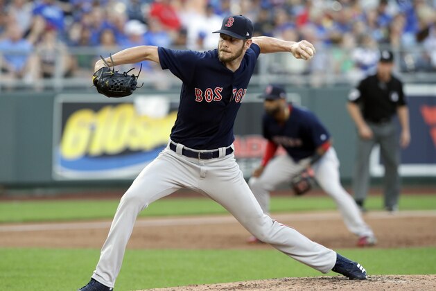 Boston Red Sox starting pitcher Chris Sale delivers to a Kansas City Royals batter during the first inning of a baseball game at Kauffman Stadium in Kansas City, Mo., Friday, July 6, 2018. (AP Photo/Orlin Wagner)