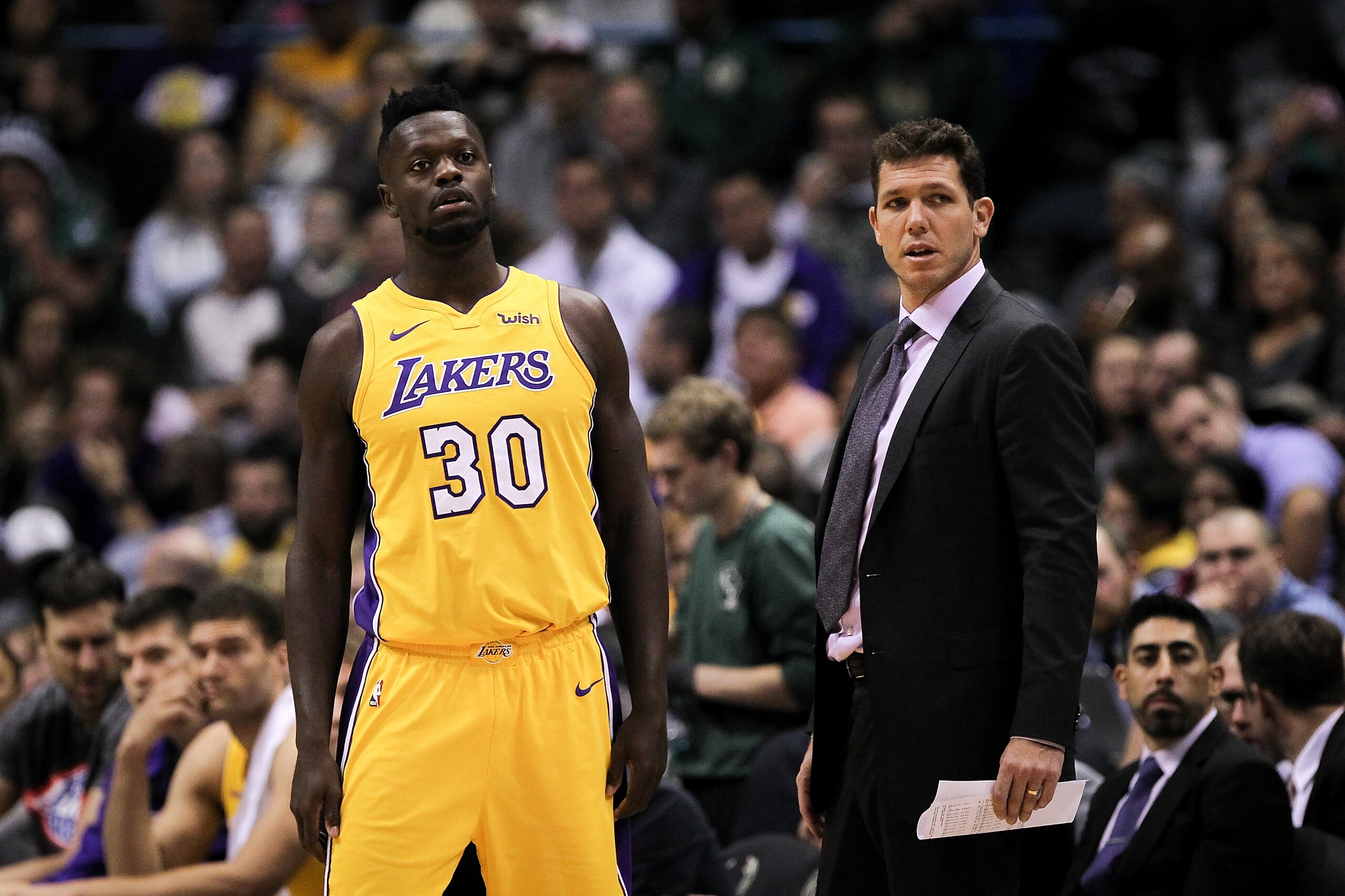 MILWAUKEE, WI - NOVEMBER 11: Julius Randle #30 of the Los Angeles Lakers meet with head coach Luke Walton in the third quarter against the Milwaukee Bucks at the Bradley Center on November 11, 2017 in Milwaukee, Wisconsin. NOTE TO USER: User expressly acknowledges and agrees that, by downloading and or using this photograph, User is consenting to the terms and conditions of the Getty Images License Agreement. (Photo by Dylan Buell/Getty Images) MILWAUKEE, WI - NOVEMBER 11: Julius Randle #30 of the Los Angeles Lakers meet with head coach Luke Walton in the third quarter against the Milwaukee Bucks at the Bradley Center on November 11, 2017 in Milwaukee, Wisconsin. NOTE TO USER: User expressly acknowledges and agrees that, by downloading and or using this photograph, User is consenting to the terms and conditions of the Getty Images License Agreement. (Photo by Dylan Buell/Getty Images)