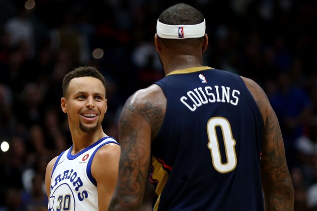 NEW ORLEANS, LA - OCTOBER 20:   DeMarcus Cousins #0 of the New Orleans Pelicans exchanges words with Stephen Curry #30 of the Golden State Warriors during a game at Smoothie King Center on October 20, 2017 in New Orleans, Louisiana.  NOTE TO USER: User expressly acknowledges and agrees that, by downloading and or using this photograph, User is consenting to the terms and conditions of the Getty Images License Agreement. (Photo by Sean Gardner/Getty Images)