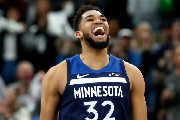 Minnesota Timberwolves' Karl-anthony Towns plays against the Houston Rockets in the first half during Game 3 of an NBA basketball first round playoff series Saturday, April 21, 2018, in Minneapolis. (AP Photo/Jim Mone)