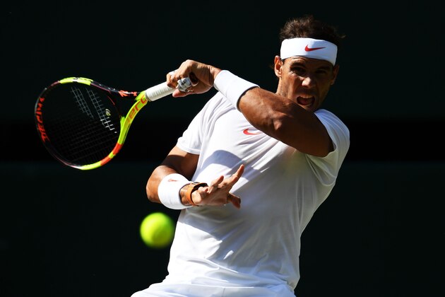LONDON, ENGLAND - JULY 11:  Rafael Nadal of Spain plays a forehand against Juan Martin Del Potro of Argentina during their Men's Singles Quarter-Finals match on day nine of the Wimbledon Lawn Tennis Championships at All England Lawn Tennis and Croquet Club on July 11, 2018 in London, England.  (Photo by Clive Mason/Getty Images)