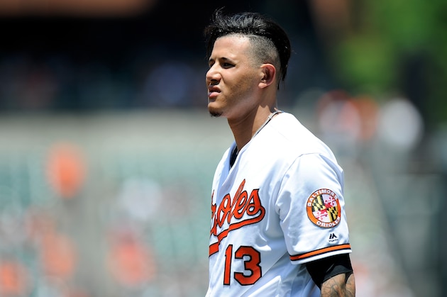 BALTIMORE, MD - JULY 01:  Manny Machado #13 of the Baltimore Orioles walks to the dugout during the game against the Los Angeles Angels at Oriole Park at Camden Yards on July 1, 2018 in Baltimore, Maryland.  (Photo by G Fiume/Getty Images)