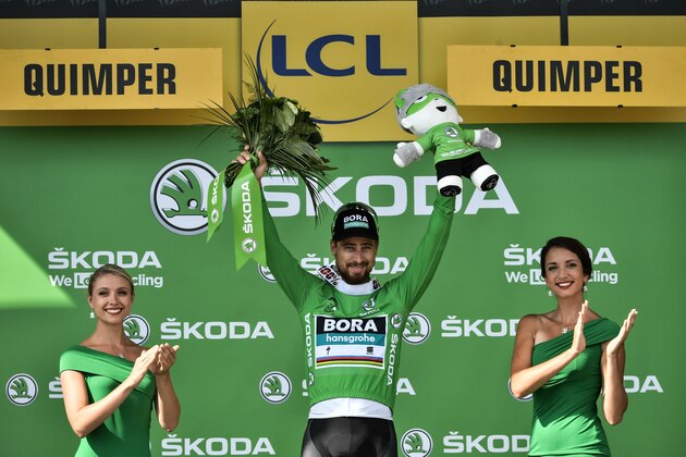 Slovakia's Peter Sagan celebrates on the podium after winning the fifth stage of the 105th edition of the Tour de France cycling race between Lorient and Quimper, western France, on July 11, 2018. (Photo by Marco BERTORELLO / AFP)        (Photo credit should read MARCO BERTORELLO/AFP/Getty Images)