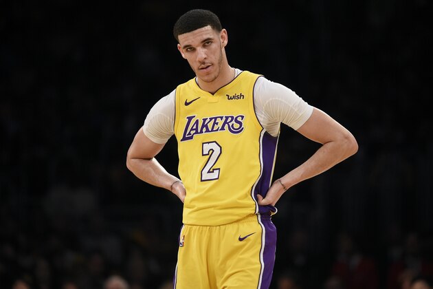 Los Angeles Lakers guard Lonzo Ball looks on during the first half of an NBA basketball game against the Denver Nuggets in Los Angeles, Tuesday, March 13, 2018. (AP Photo/Kelvin Kuo)
