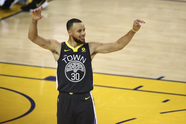 Golden State Warriors guard Stephen Curry (30) celebrates during the second half of Game 2 of basketball's NBA Finals between the Golden State Warriors and the Cleveland Cavaliers in Oakland, Calif., Sunday, June 3, 2018. (AP Photo/Ben Margot)