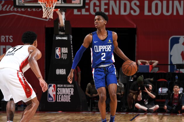 LAS VEGAS, NV - JULY 9:  Shai Gilgeous-Alexander #2 of the LA Clippers handles the ball against the Houston Rockets during the 2018 Las Vegas Summer League on July 9, 2018 at the Thomas & Mack Center in Las Vegas, Nevada. NOTE TO USER: User expressly acknowledges and agrees that, by downloading and or using this Photograph, user is consenting to the terms and conditions of the Getty Images License Agreement. Mandatory Copyright Notice: Copyright 2018 NBAE (Photo by Garrett Ellwood/NBAE via Getty Images)